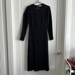 Aritiza Babaton size 2 dress shows back with delicate button and zip